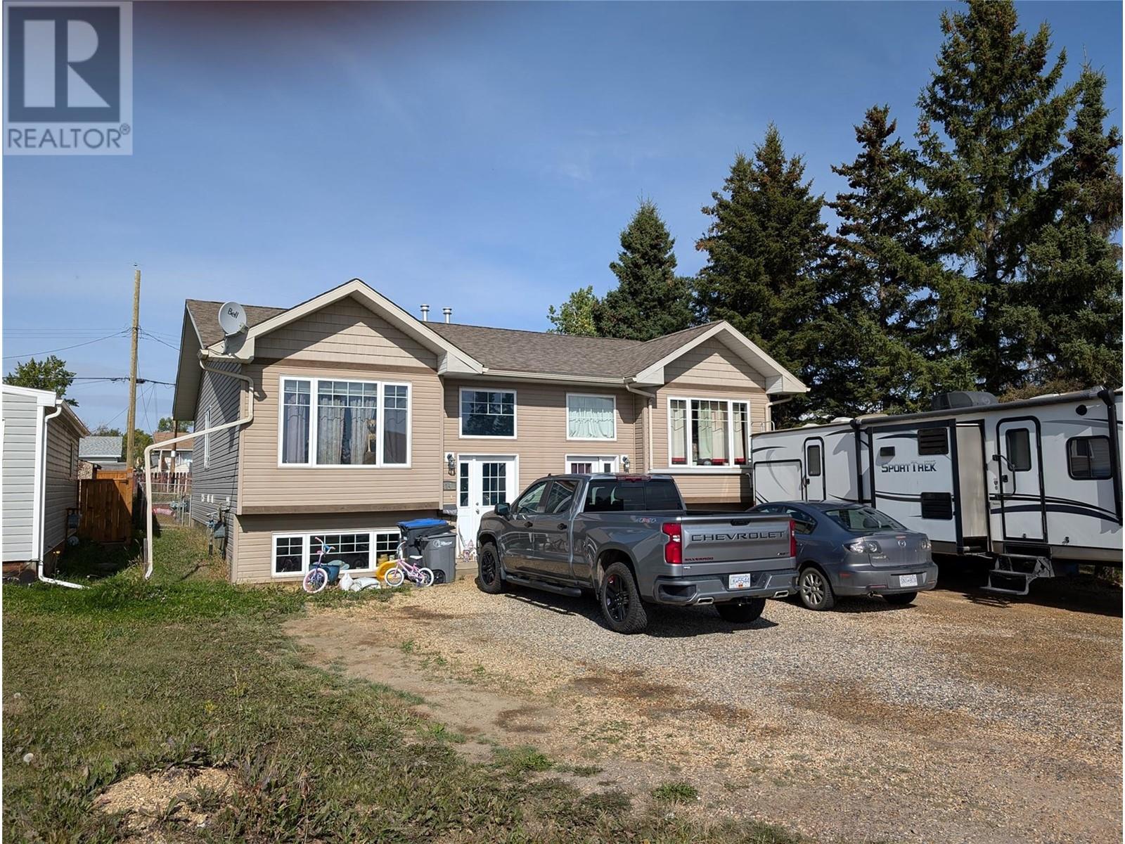 312 99 Avenue, Dawson Creek, British Columbia  V1G 1S9 - Photo 1 - 10324596