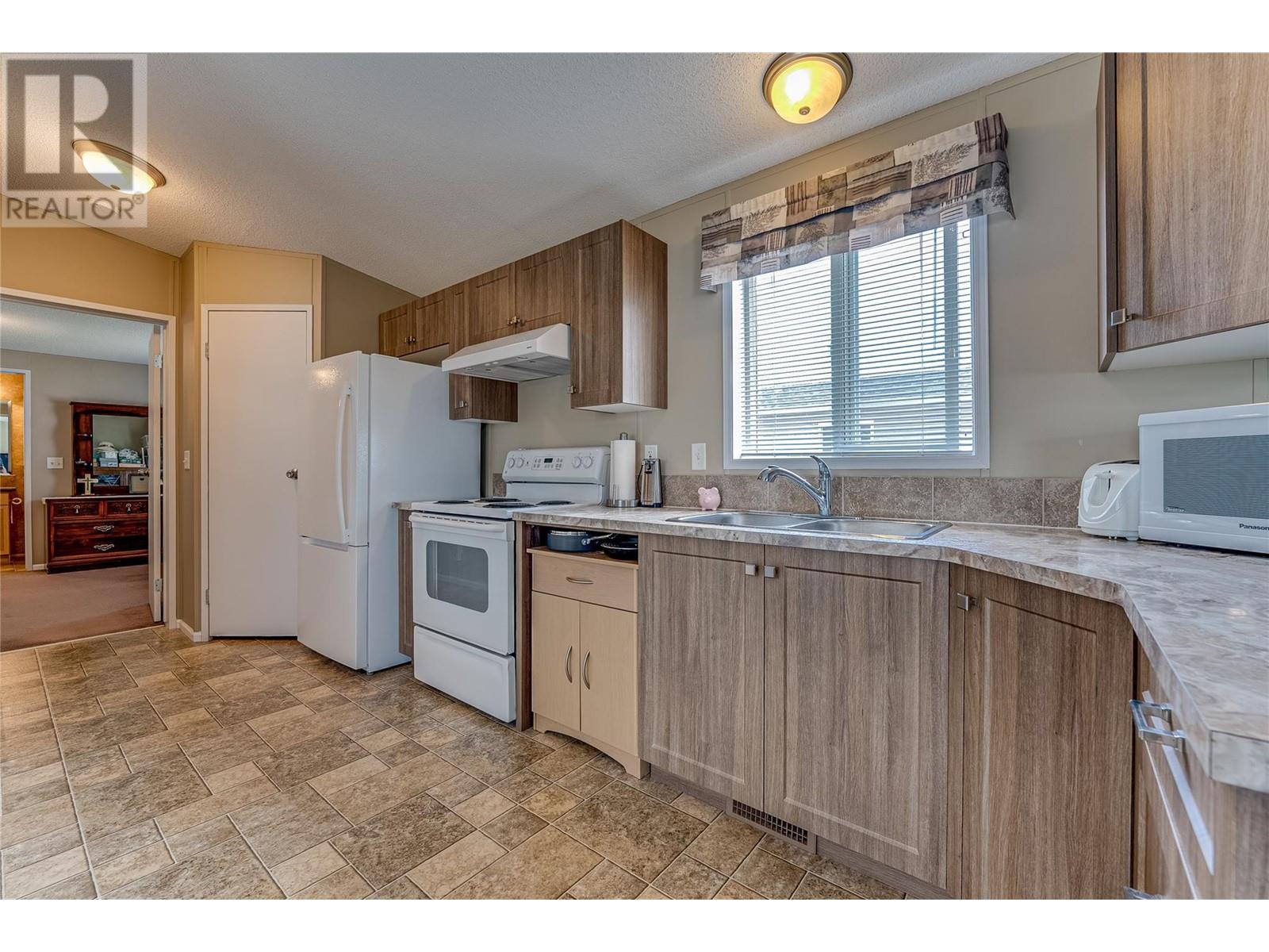 12560 Westside Road Unit# 74, Vernon, British Columbia  V1H 1S9 - Photo 8 - 10327499